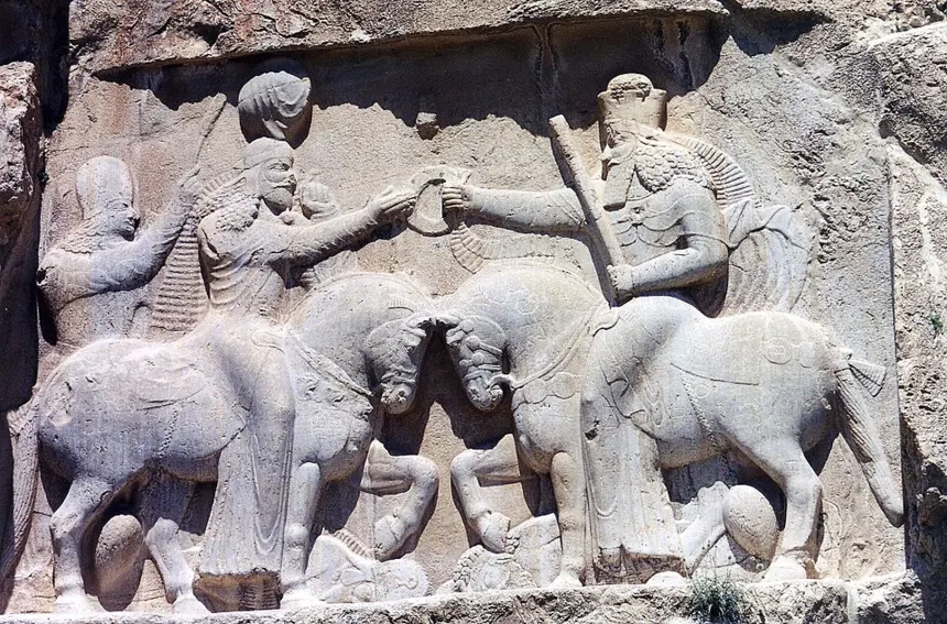 Zerdüştlük — A relief at Naqsh-e Rustam with Ardeshir I and unidentified cavalier. This Persian rock relief depicts Ardashir I Coronation scene; the first king of the Sassanid Empi
